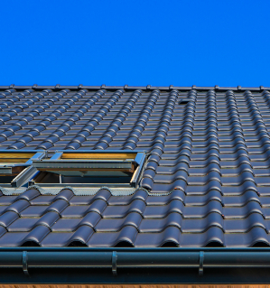 newly renovated roof with dark gray finish