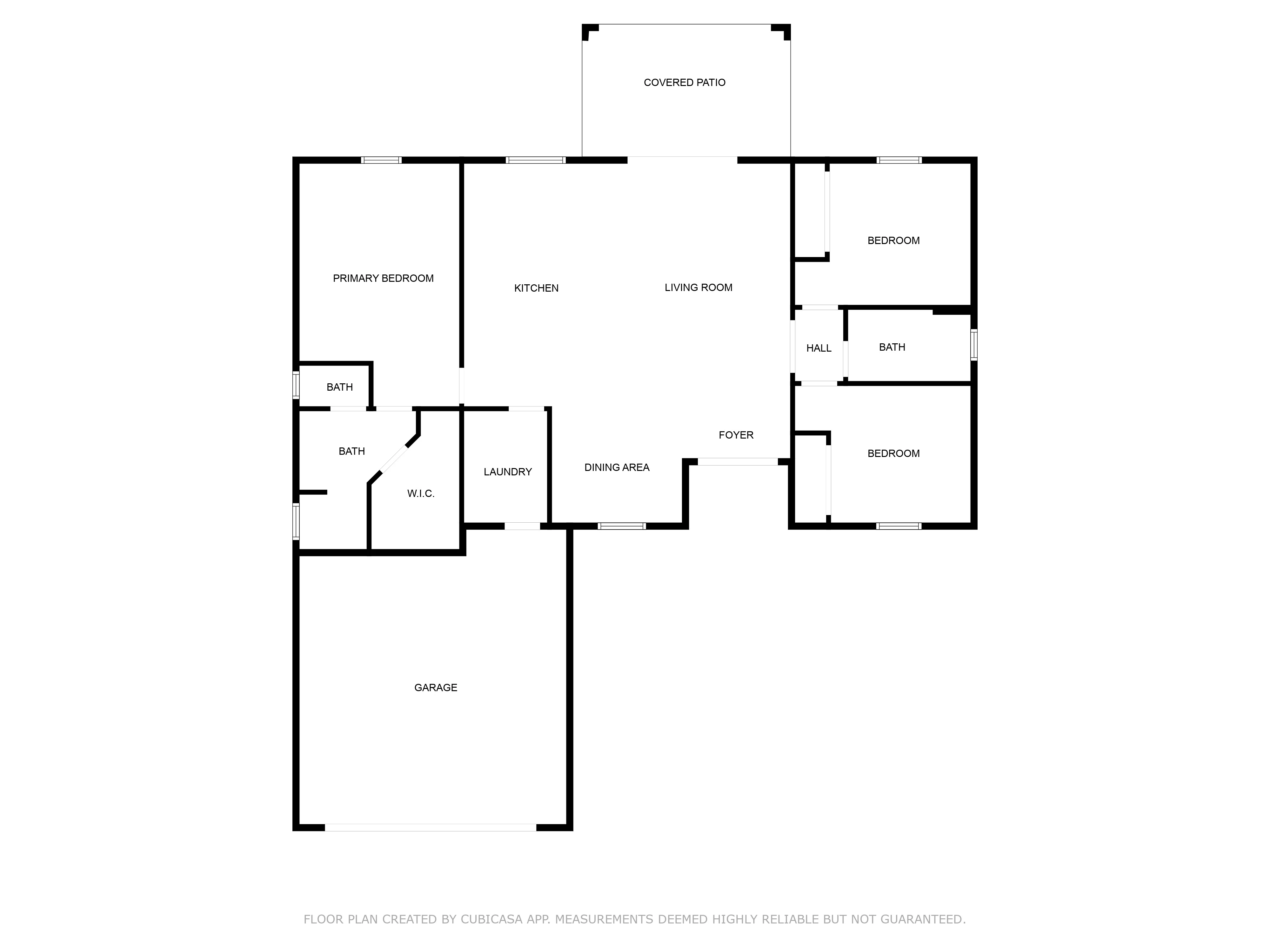 Architectural floor plan of a newly built custom home in Florida by Vreeland Roofing. The blueprint showcases a spacious layout with a modern open-concept design, including a primary bedroom, multiple bathrooms, a kitchen, living room, laundry area, dining space, and a covered patio. Expertly planned for efficiency, comfort, and high-quality construction.