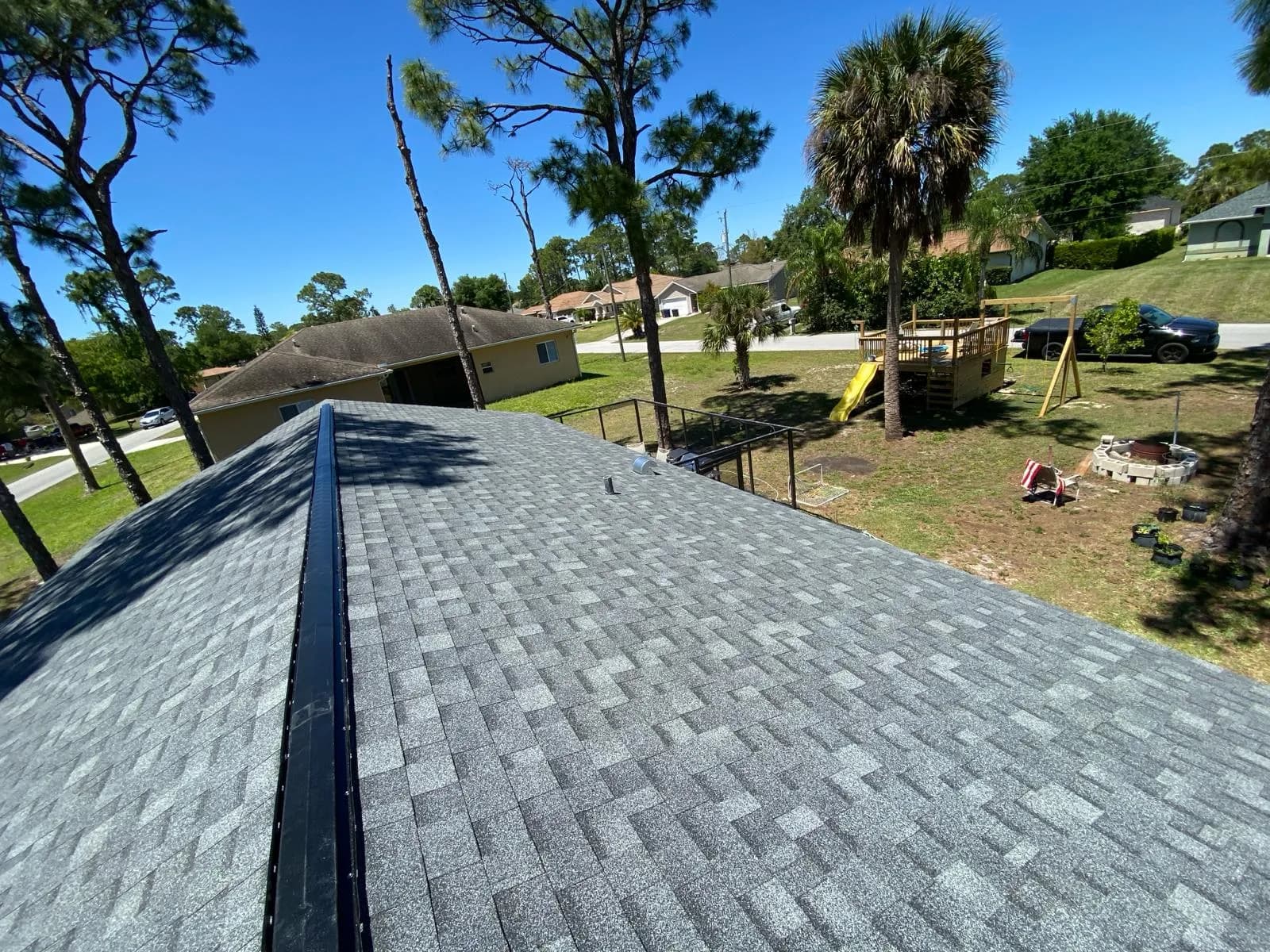 High-quality Charcoal Grey shingle roof installation - Durable, weather-resistant, and aesthetically appealing roofing solution by Vreeland Roofing in Florida.