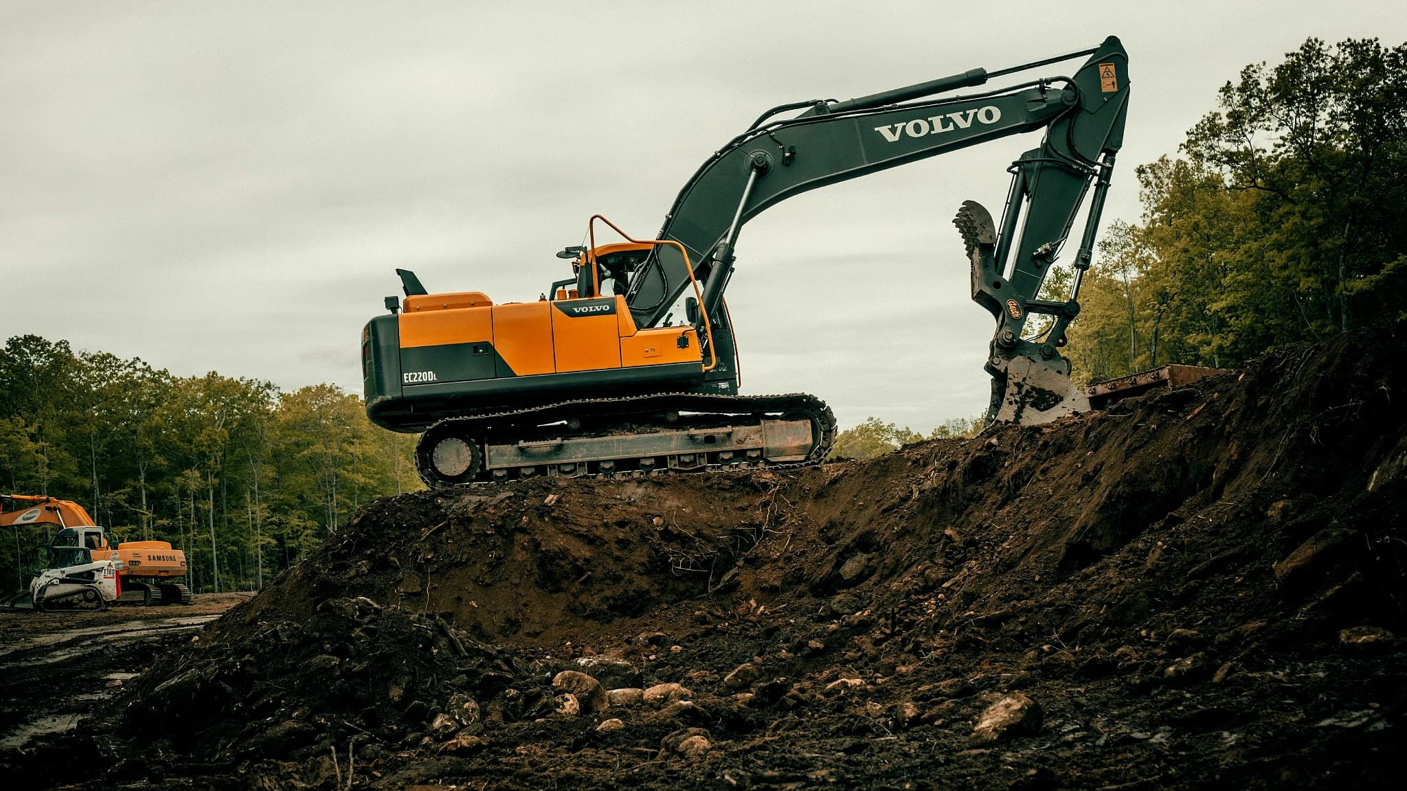 Excavation equipment in action for land clearing by Vreeland Roofing, preparing the site for construction in Florida.