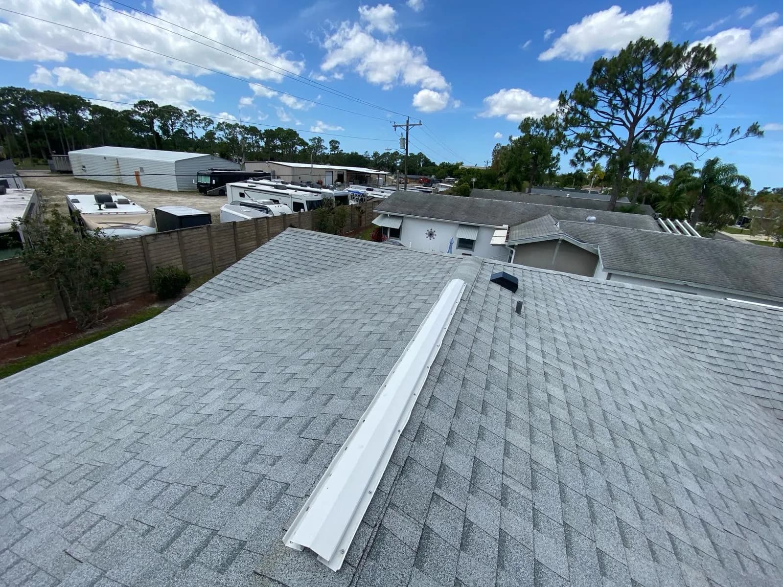 Vreeland roofing service, type shingle color Oyster Shell.